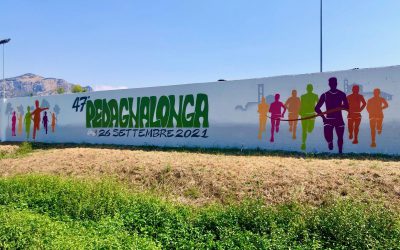 Ecco il nuovo murale della Pedagnalonga. Corsa e passeggiata unite dal ritorno alla monumentale scritta sul muro del campo sportivo